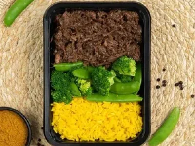 Res mechada teriyaki + arroz amarillo + brocoli​